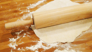 rolling-out-homemade-pizza-dough